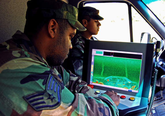 Members of the 820th Security Forces Group use a Z Backscatter Van to scan a suspect vehicle during a training exercise at Moody Air Force Base. Image courtesy of US Air Force photo / Tech. Sgt. Parker Gyokeres.